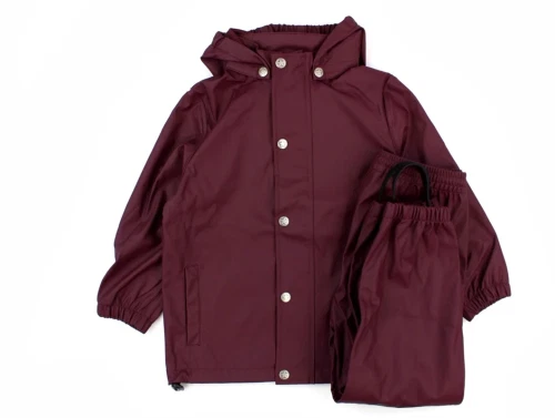 En Fant regntøj bukser og jakke fig